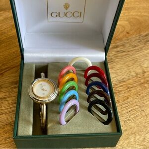 Beautiful Vintage Gucci dressy gold bangle watch with bezels gold silver box